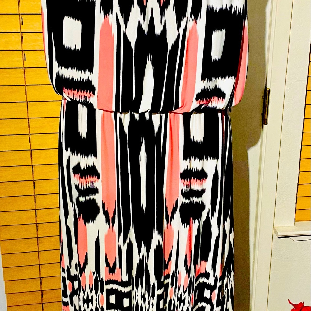 Established 1962- women’s long polyester dress. Sleeveless